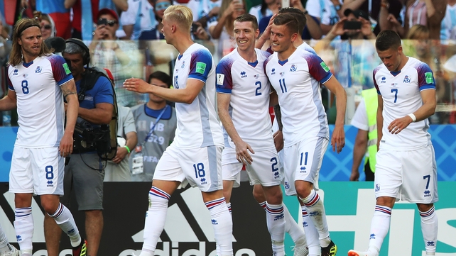 Alfred Finnbogason is congratulated by team-mates after scoring his side's equaliser