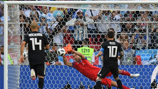 Hanne Halldorsson denies Lionel Messi from the penalty spot