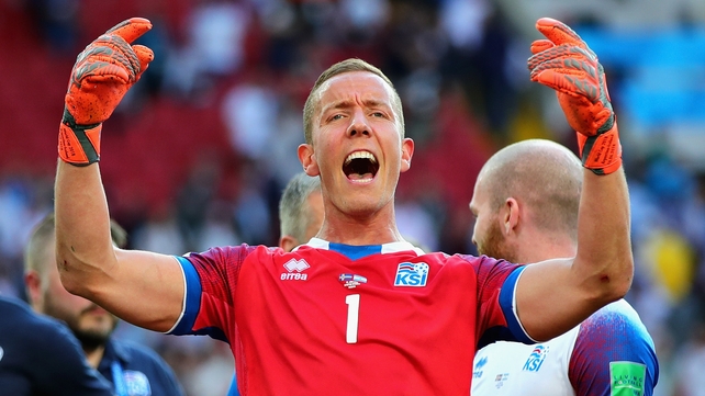 Hannes Halldorsson celebrates after the final whistle