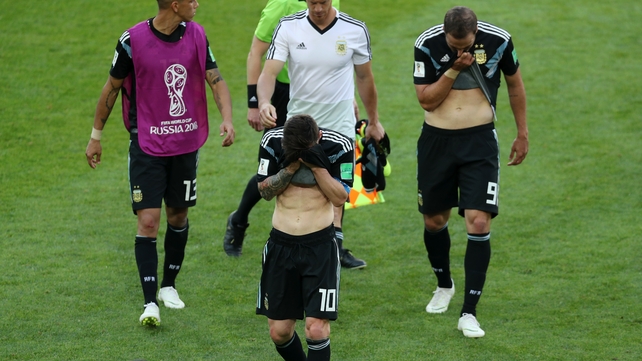 Lionel Messi and Gonzalo Higuain are dejected at the end of the game