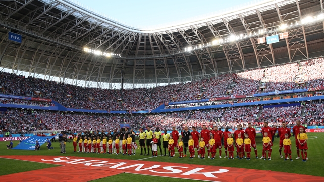 General view inside the stadium as Peru and Denmark line up to sing their national anthems pre-match