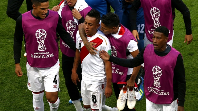 Christian Cueva is consoled by teammates as he walks off at half time, moments after missing a penalty