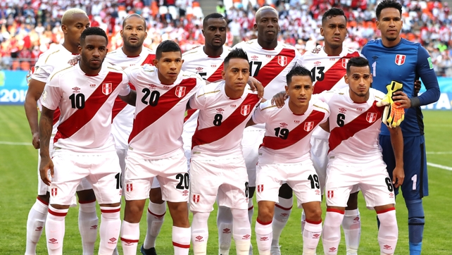 The Peruvian players line up for their pre-match team photo