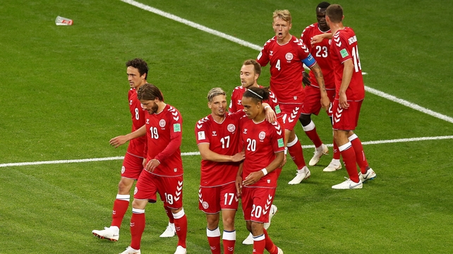 Yussuf Yurary Poulsen celebrates with team mates after scoring the match winner in Saransk