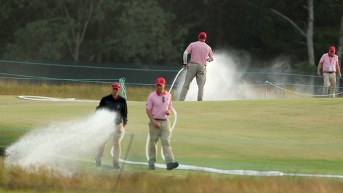 Work began on Saturday evening to make Shinnecock Hill a more playable course