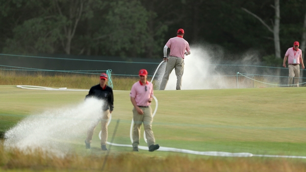 Work began on Saturday evening to make Shinnecock Hill a more playable course