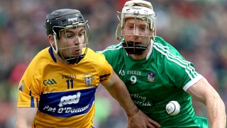 Tony Kelly of Clare and Cian Lynch of Limerick compete for possession