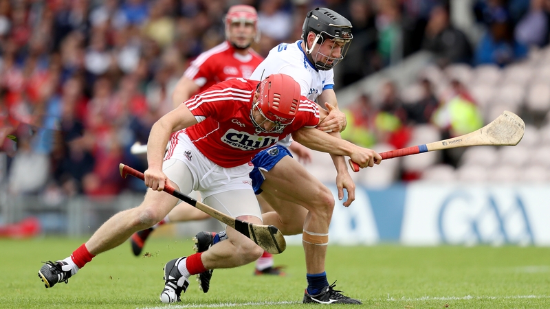 Bill Cooper wrestles for the ball with Jamie Barron as Cork eked out a victory over Waterford in Thurles