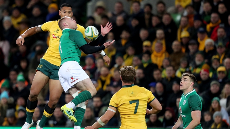 Keith Earls wins a high ball ahead of Israel Folau during the second Test between Ireland and Australia n Melbourne