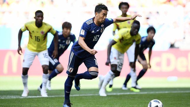 Shinji Kagawa scores from the penalty spot