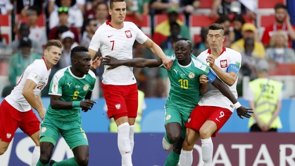 Idrissa Gana Gueye of Senegal, Arkadiusz Milik of Poland, Sadio Mane of Senegal, Robert Lewandowski of Poland