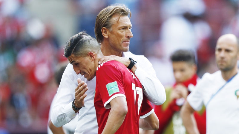 Herve Renard of Morocco comforts Nabil Dirar