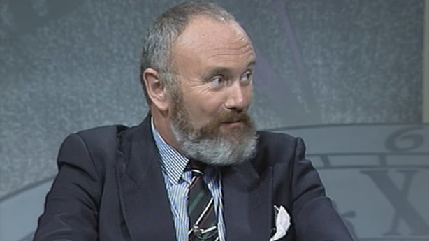 David Norris, a white middle aged man with a beard, against a grey background