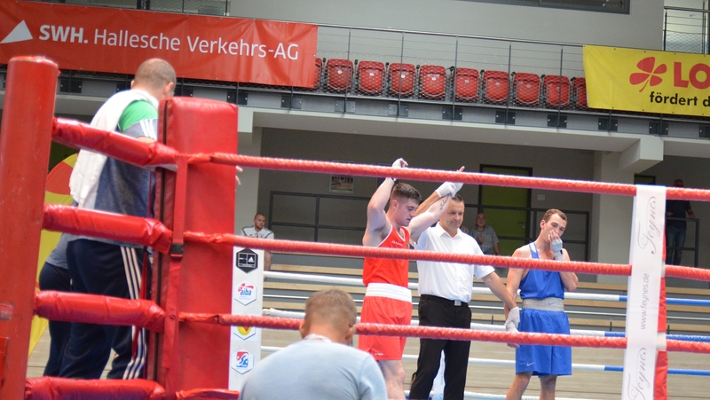 Joe Ward's arm is held aloft after winning Pic: Tibor (AIBA)