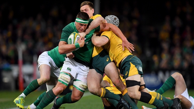 CJ Stander of Ireland is tackled by Dane Haylett-Petty and Nick Phipps