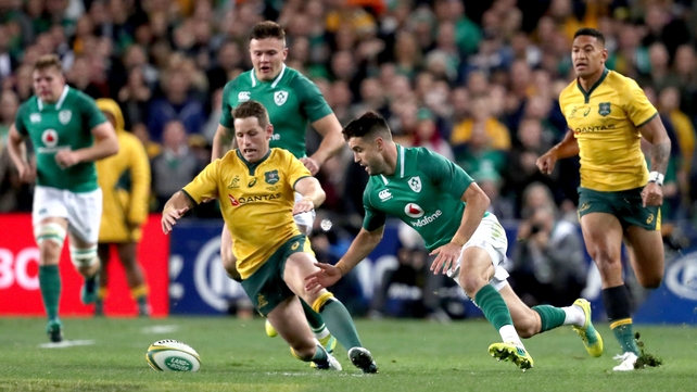 Bernard Foley battles for possession with Conor Murray