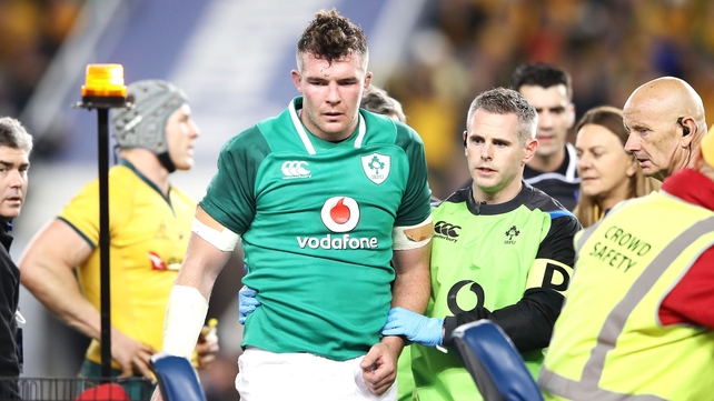 Peter O'Mahony is helped to the medicab before leaving the field