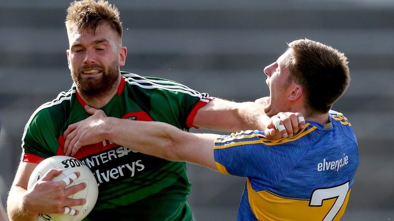 Aidan O'Shea holds off Tipperary's Jimmy Feehan