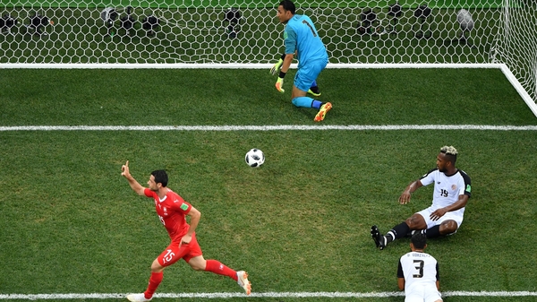 Switzerland's midfielder Blerim Dzemaili celebrates after scoring the opening goal
