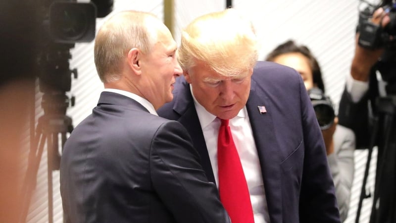 Vladimir Putin and Donald Trump speak at the 25th APEC Summit in Vietnam in November 2017