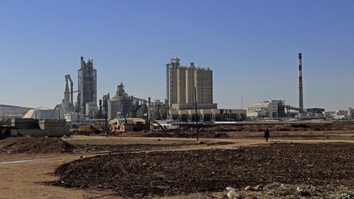 The French-Swiss company said it is counting on 'solid market demand' for its building materials to continue