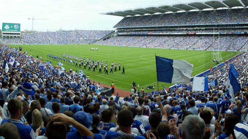 Dublin and Laois walk on to the Croke Park pitch for the 2005 Leinster SFC final