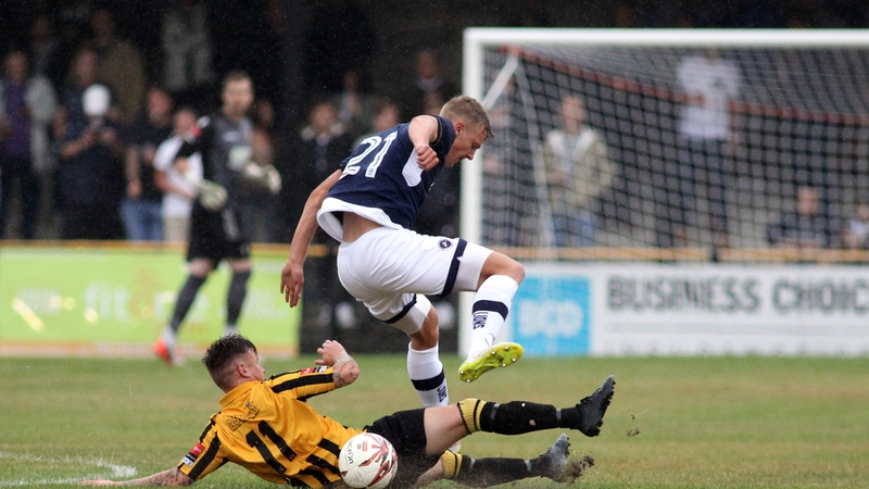 Kris Twardek (navy) in action for Millwall