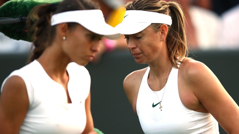 Maria Sharapova (r) is out