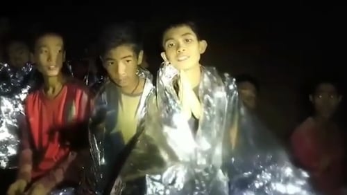 The boys and their coach have been trapped in the cave for two weeks