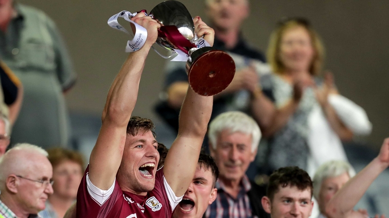 Galway captain Fintan Burke lifts the trophy