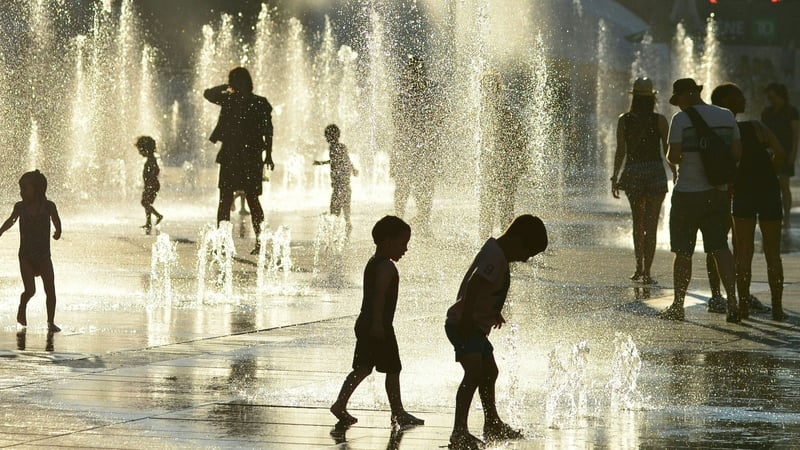 Children playing in a fountain in Montreal as temperatures soar