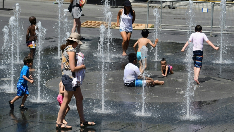 Children playing in a fountain in Montreal as temperatures soar