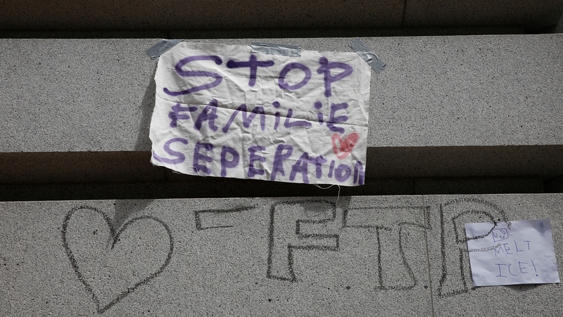 A banner displayed during a protest against US immigration policies outside the San Francisco office of Immigration and Customs Enforcement (ICE)