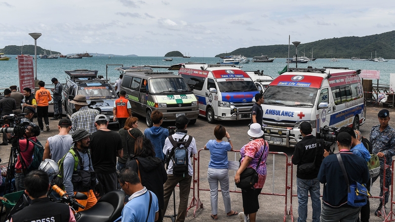 Ambulances wait at Chalong Pier on Phuket island
