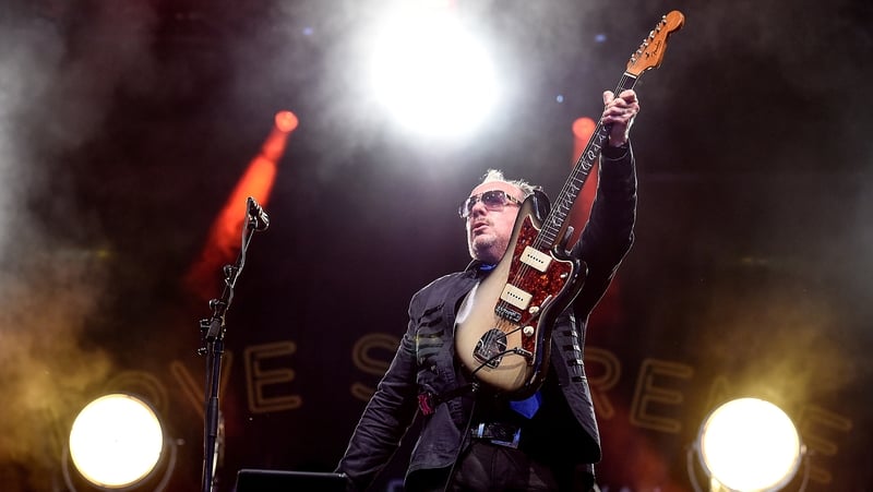 Elvis Costello - Everyone in tune, right? Let's go . . .