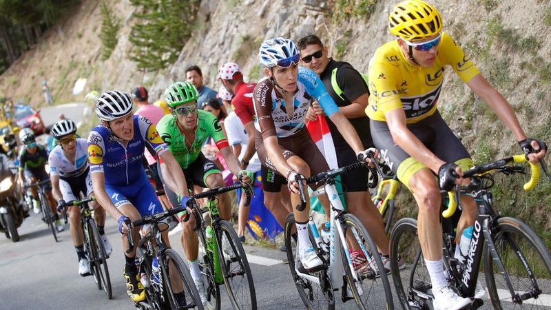 Dan Martin (L, blue jersey) will have Chris Froome in his sights