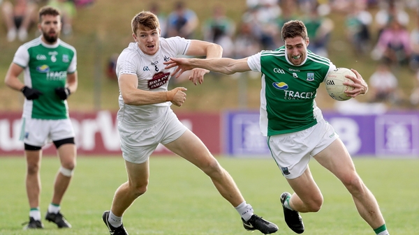 Fermanagh's Eoin Donnelly with Kevin Feely of Kildare