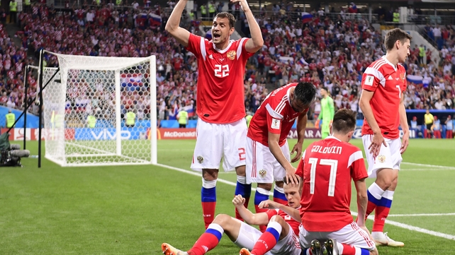 Russia's players celebrate Cheryshev's opening goal