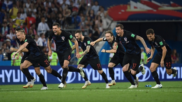 Croatia's players celebrate winning the penalty shootout