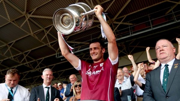 David Burke lifts the Bob O'Keeffe Cup after victory over Kilkenny
