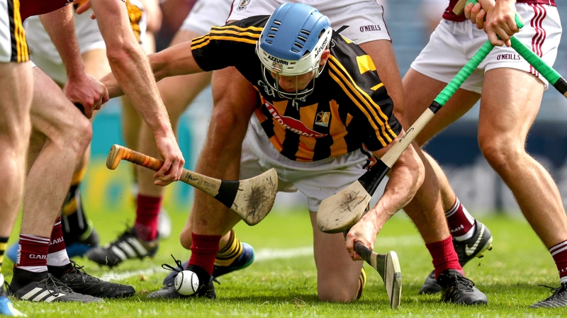 TJ Reid fends off the Galway players