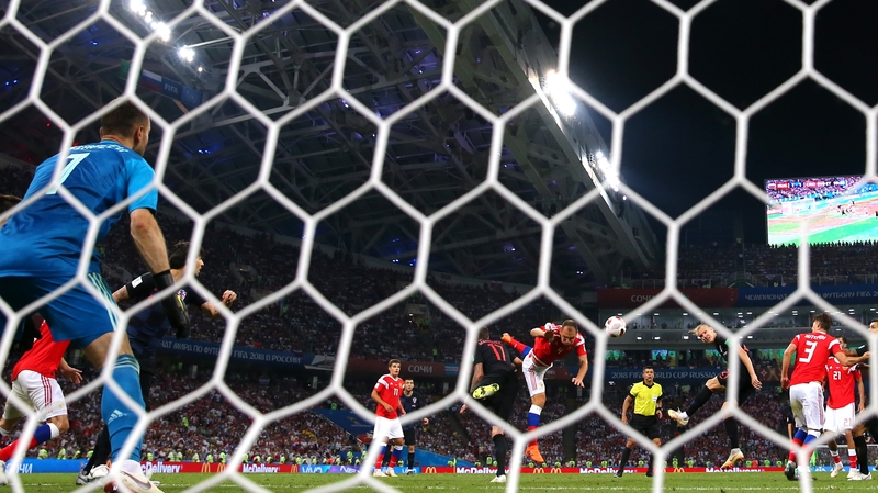 Domagoj Vida of Croatia scores his team's second goal v Russia