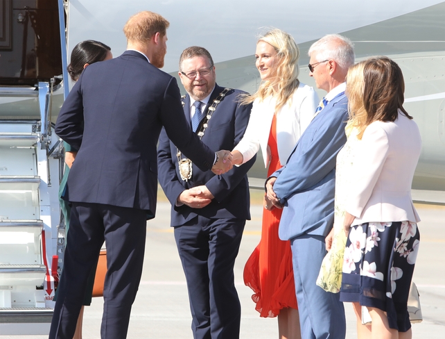The royal couple being greeted on their arrival at Dublin Airport