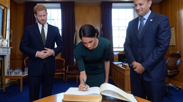 They then went inside to sign the visitors' book
