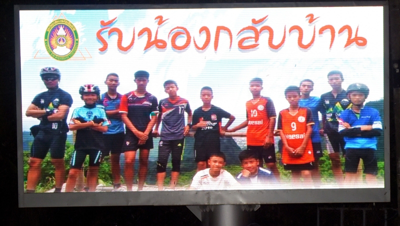 A billboard showing Coach Ekkapol Chantawong and his Wild Boars team