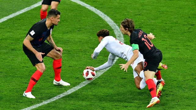 Luka Modric fouls Dele Alli and England have an early dead ball opportunity