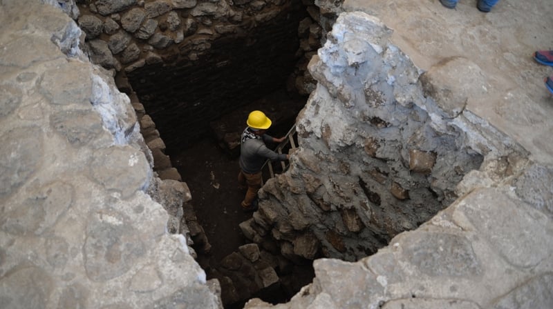 Archaeologists work at the archaeological site of Teopanzolco