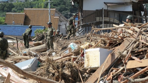Clean-up operations after floods and landslides in western Japan