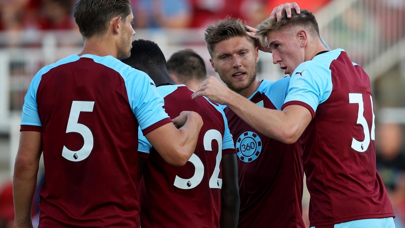 Jimmy Dunne (r) featured in a pre-season game against Cork City