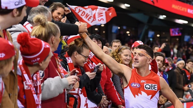 Colin O'Riordan interacting with the fans after the game.
